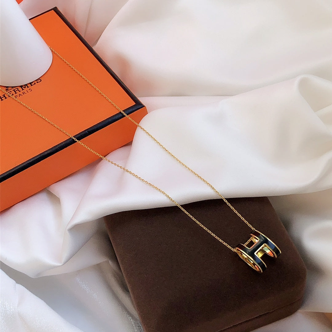 HERMES HM CLIC BLACK ENAMEL GOLD NECKLACE