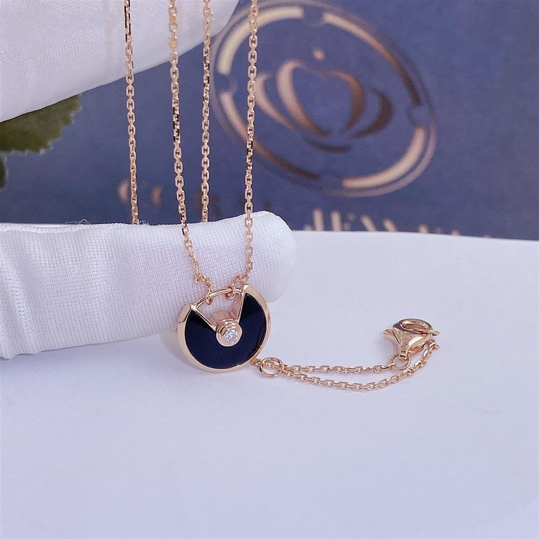 CARTIER AMULETTE ROSE GOLD ONYX NECKLACE